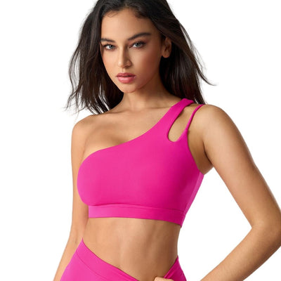 Easelyn Asymmetric One-Shoulder Sports Bra in pink, front view