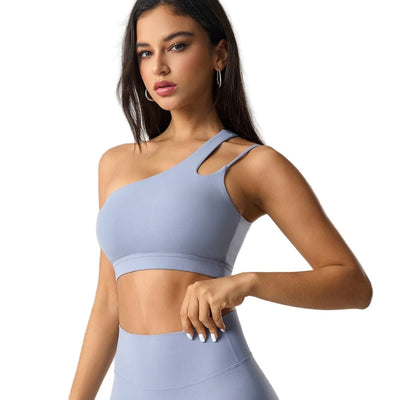 Easelyn Asymmetric One-Shoulder Sports Bra in blue, front view