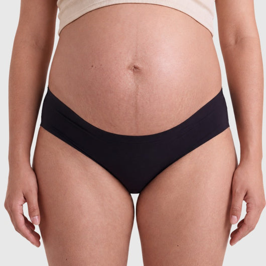Easelyn Seamless Maternity Briefs — 5 Pack in black, front view under the bump