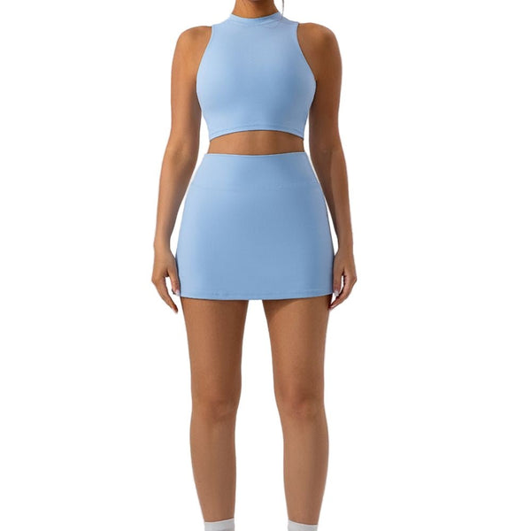 Easelyn High-Neck Sports Bra in blue, styled full-length front view