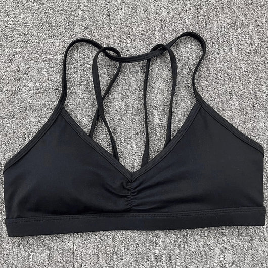 Easelyn Strappy-Back Wireless Bralette in black, flat lay