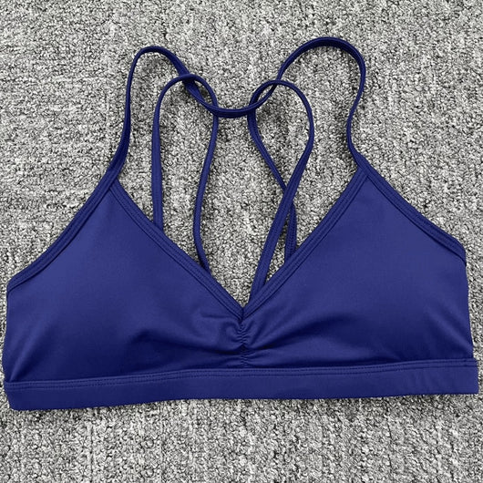 Easelyn Strappy-Back Wireless Bralette in dark blue, flat lay