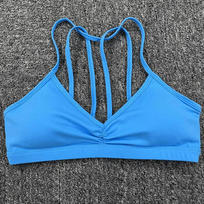Easelyn Strappy-Back Wireless Bralette in blue, flat lay