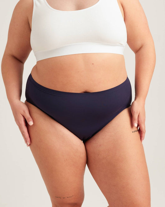 Easelyn Leakproof Seamless High-Waist Period Brief in midnight sky, front view on a curvy model