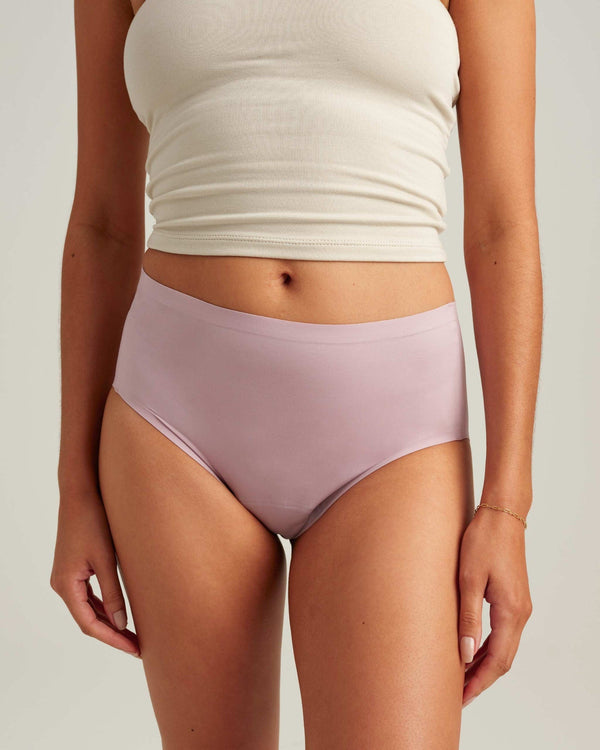 Easelyn Leakproof Seamless High-Waist Period Brief in sunset mauve, front view on model