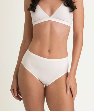 Easelyn Leakproof Seamless High-Waist Period Brief in soft sand, front view on model