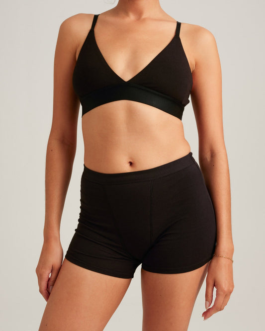 Easelyn Overnight Leakproof Sleep Short in volcanic black, front view on model