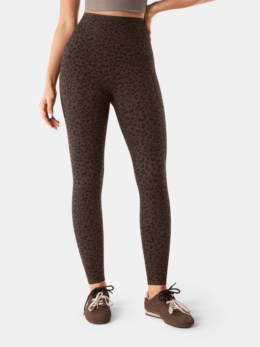 Easelyn Built-In Resistance Band Leggings in Brown Leopard, front view from the waist down showing the high waistband and full length