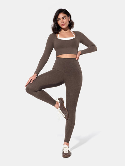 Easelyn Built-In Resistance Band Leggings in Brown Heather, full-body front view with one knee raised, solid reverse side with the high waistband