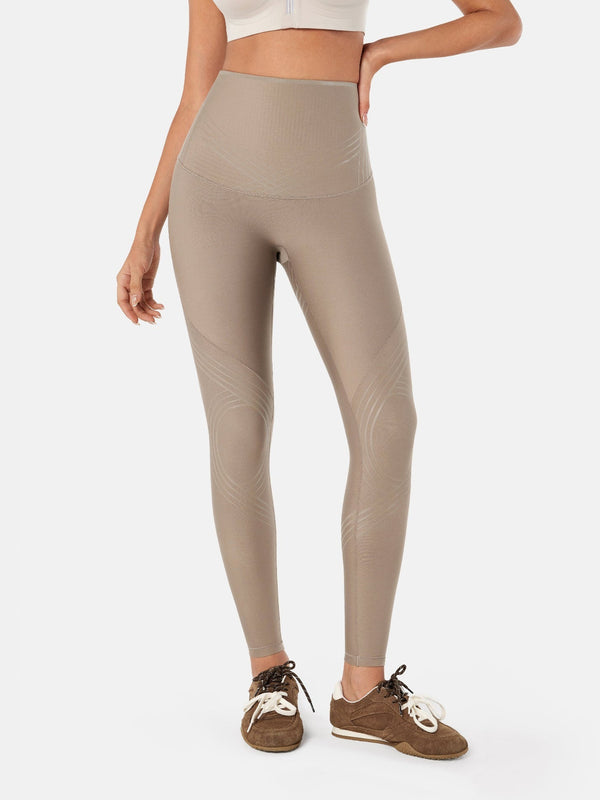 Easelyn Postpartum Recovery Compression Leggings in Tan, front view from the waist down showing the smooth front and high waist panel