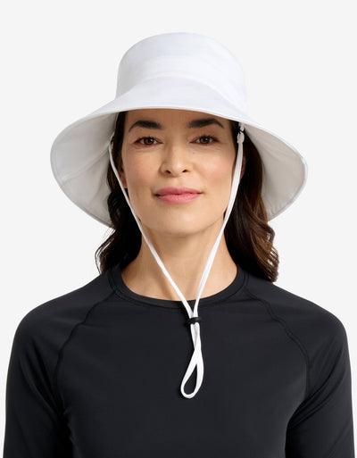 Easelyn UPF 50+ Wide-Brim Sun Hat in White, close front view on model with the chin strap fastened