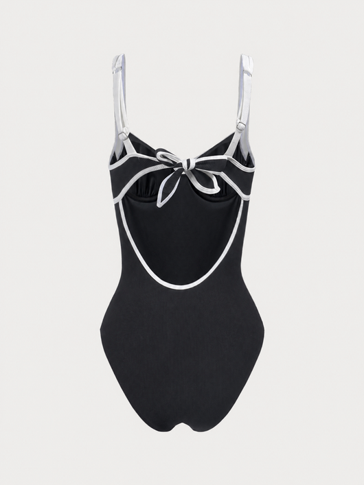 Easelyn Contrast-Trim Knotted Cutout One-Piece Swimsuit in Black, flat back view showing the knotted cutout framed in contrast trim