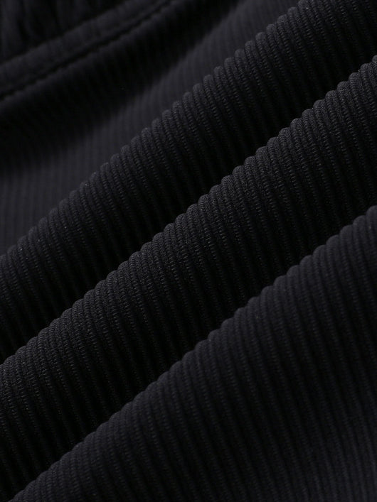 Easelyn Contrast-Trim Knotted Cutout One-Piece Swimsuit in Black, close-up of the ribbed fabric
