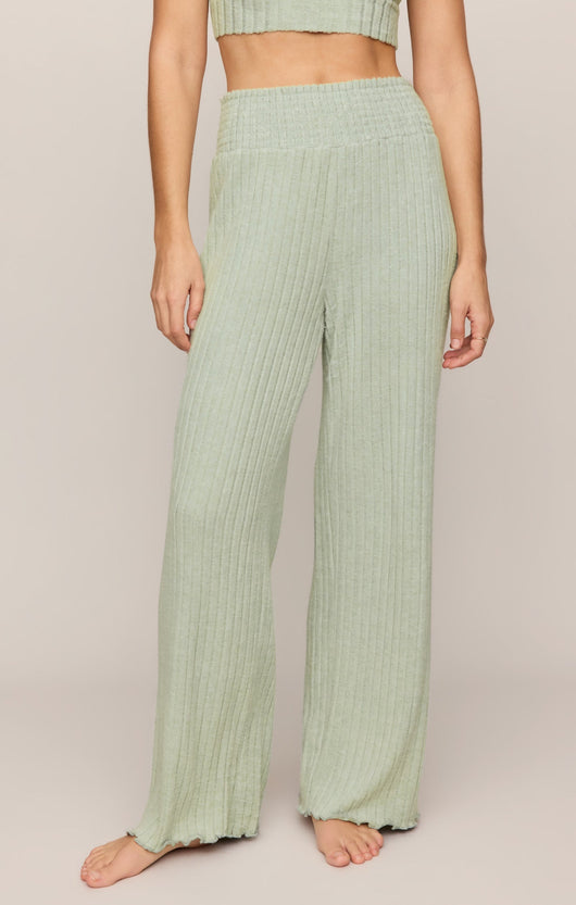 Easelyn Smocked-Waist Rib Flare Lounge Pant in Aqua Cloud, front view from the waist down showing the smocked waistband and flared rib leg