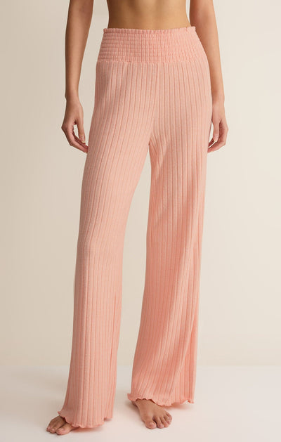 Easelyn Smocked-Waist Rib Flare Lounge Pant in Bellini, front view from the waist down