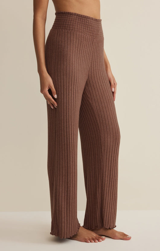 Easelyn Smocked-Waist Rib Flare Lounge Pant in Macchiato, side view showing the high rise and the flared leg