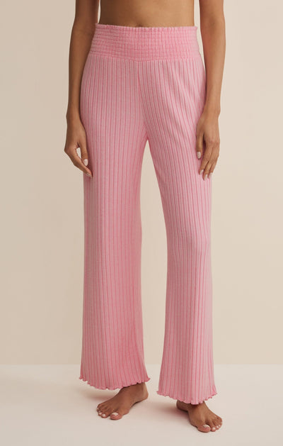 Easelyn Smocked-Waist Rib Flare Lounge Pant in Passion Fruit, front view from the waist down