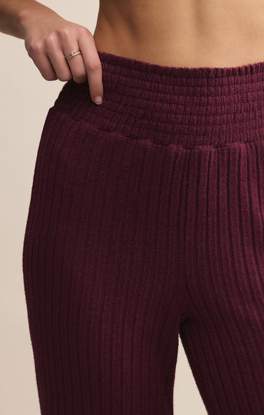 Easelyn Smocked-Waist Rib Flare Lounge Pant in Merlot, close-up of the smocked waistband and rib knit